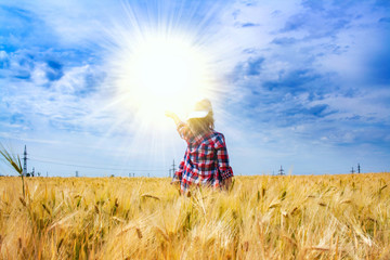 Unity with Light . Silhouette of man and sunshine . Hands in sky