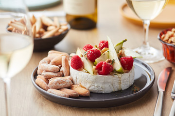 Baked Camembert with berries and fruit.