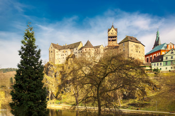 Fototapeta na wymiar Amazing landmark in Czech Republic, near Karlovy Vary Loket middleaged castle with blue sky in spring.