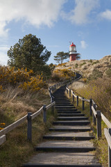 Fototapeta na wymiar Vlieland wadden island. Waddenzee Netherlands lighthouse. Stairs. Path. Dunes.