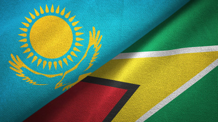 Kazakhstan and Guyana two flags textile cloth, fabric texture