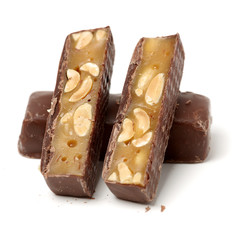 Chocolate peanut candy on white background