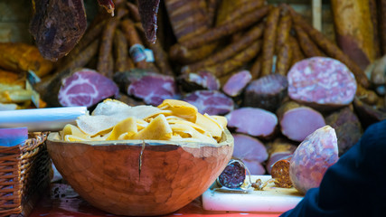 sausages and pastrami and pork meat on christmas market