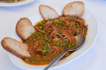 Baby Octopus and Farro soup with toast, Food of Bocca di Magra Italy