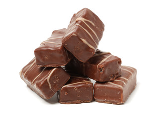 Chocolate peanut candy on white background