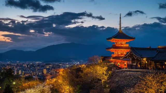 Time lapse of Kyoto city with red pagoda at twilight, Japan. 