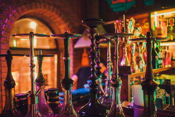 many hookah caps in a hookah cafe. © Евгений Вершинин