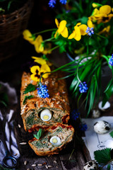 Wild nettle  whole grane loaf with eggs. Style rustic.