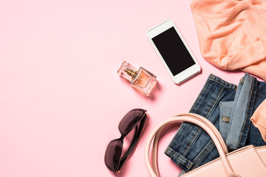 Woman flat lay background with cloth, accerrories and cosmetics. 