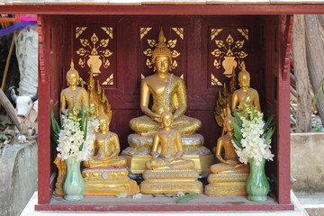 statues of buddha in a buddhist temple (Wat Phra That Lampang Luang) in Lampang (Thailand)