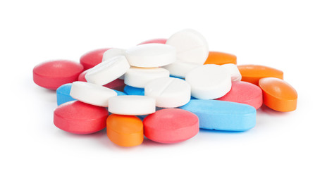 Obraz na płótnie Canvas colorful pills isolated on white