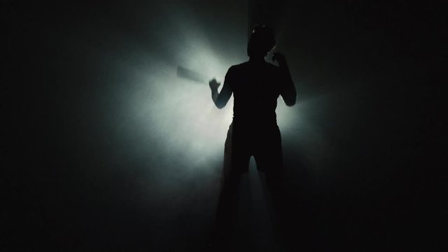 Silhouette of Squash Player | Adult Male - Dark Background