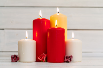 Fototapeta na wymiar home lighting candles on wooden table