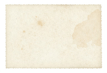 Texture old paper with traces of scuffs and stains. Isolated on white.