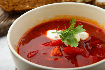Vegetable soup with beets, rustic style,Traditional Ukrainian Russian borscht. Selective focus
