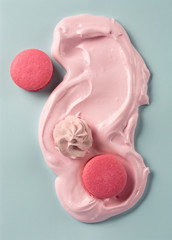 Whipped egg whites and pink macaroons