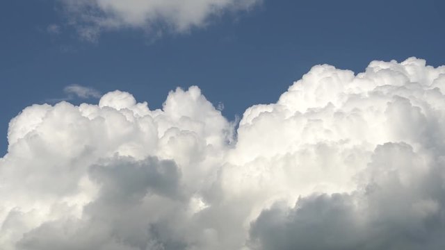 Only blue sky with fast move big metamorphic white cloud. Full HD Time Lapse footage