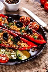 Pepper stuffed with groats and vegetables