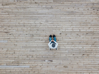 43 year old male sitting on a wheelchair in the park