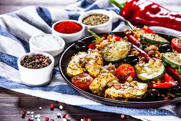 Pepper stuffed with groats and vegetables and grilled chicken strips