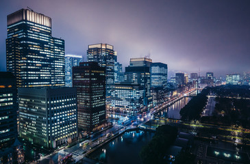 Obraz na płótnie Canvas Night view on Marunouchi commercial dsitrict in Tokyo, Japan