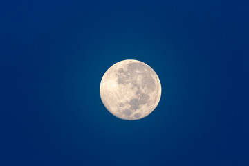 Full moon in dark blue sky