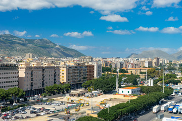 Fototapeta na wymiar Aerial view of Palermo with mountains and clouds on background