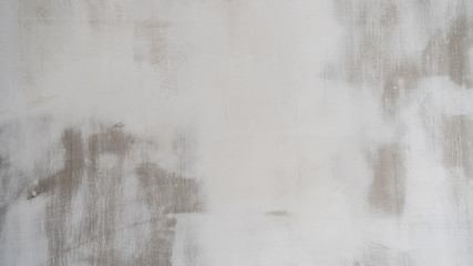 Fototapeta na wymiar Wall in white paint during repair. Background texture.