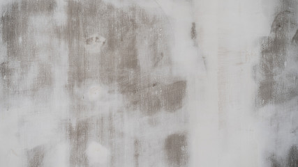 Wall in white paint during repair. Background texture.