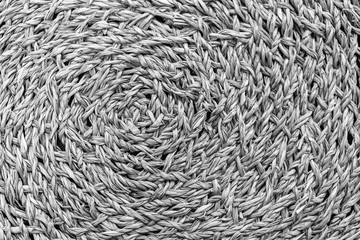 Woven black and grey wicker straw background or texture