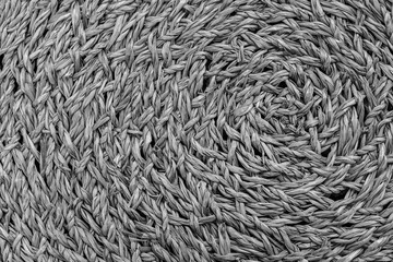 Woven black and grey wicker straw background or texture