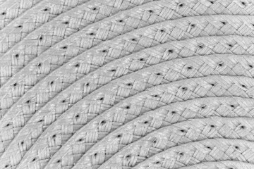 Woven white wicker straw background or texture