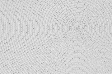 Woven white wicker straw background or texture