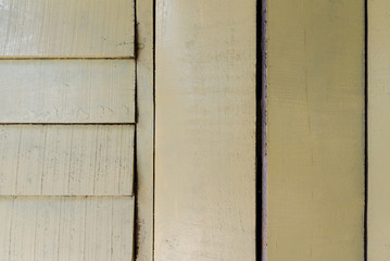Background textures or old wooden wallpapers laid the vertical and horizontal, light yellow painted in retro style.