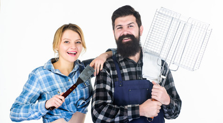 Happy to be in love. Man bearded hipster and girl. Preparation and culinary. Family weekend. Picnic & barbecue. food cooking recipe. Couple in love hold kitchen utensils. Tools for roasting meat