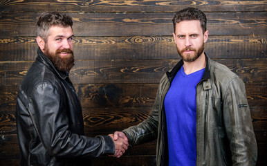 Friendship of brutal guys. Approved business deal. Handshake gesture meaning. Handshake symbol of...