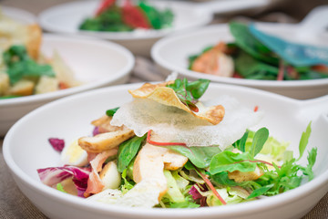 Fresh Italian salad with fish, pesto and lettuce