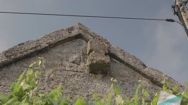 Slide shot of a sun clock in a rural village on a hill Friaes Tras-os-Montes Portugal
