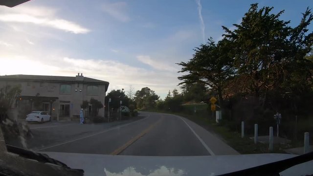 Time lapse hyperlapse driving through California town to Moonstone Beach Park in Cambria