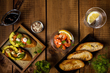 Bruschetta with shrimps and avocado.