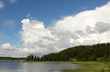 Fototapeta na wymiar landscape with lake and clouds