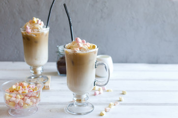 two cup of iced coffee with milk