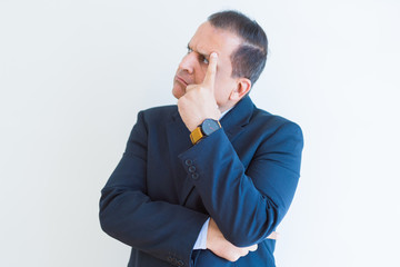 Middle age man thinking clueless about a question