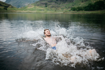 Man falling into cold water