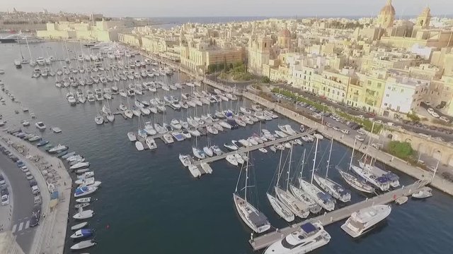 AERIAL: Flying Over the Sailboats in Bormla Harbour, Malta