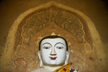statue of a Buddha inside a temple in Bagan