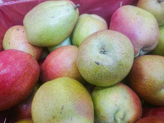 Fresh pears on the shelves of the market