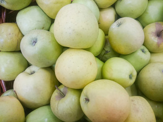 Red and green apple fruits in a supermarket