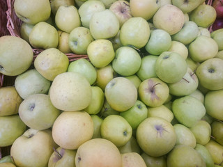 Red and green apple fruits in a supermarket