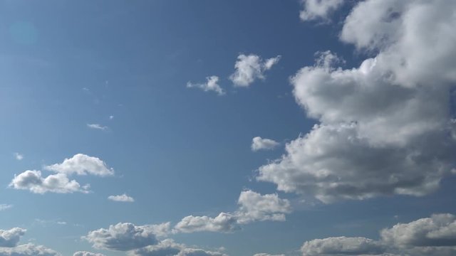 Only summer blue sky with fast moving approaching us metamorphic white clouds. Full HD Time Lapse footage